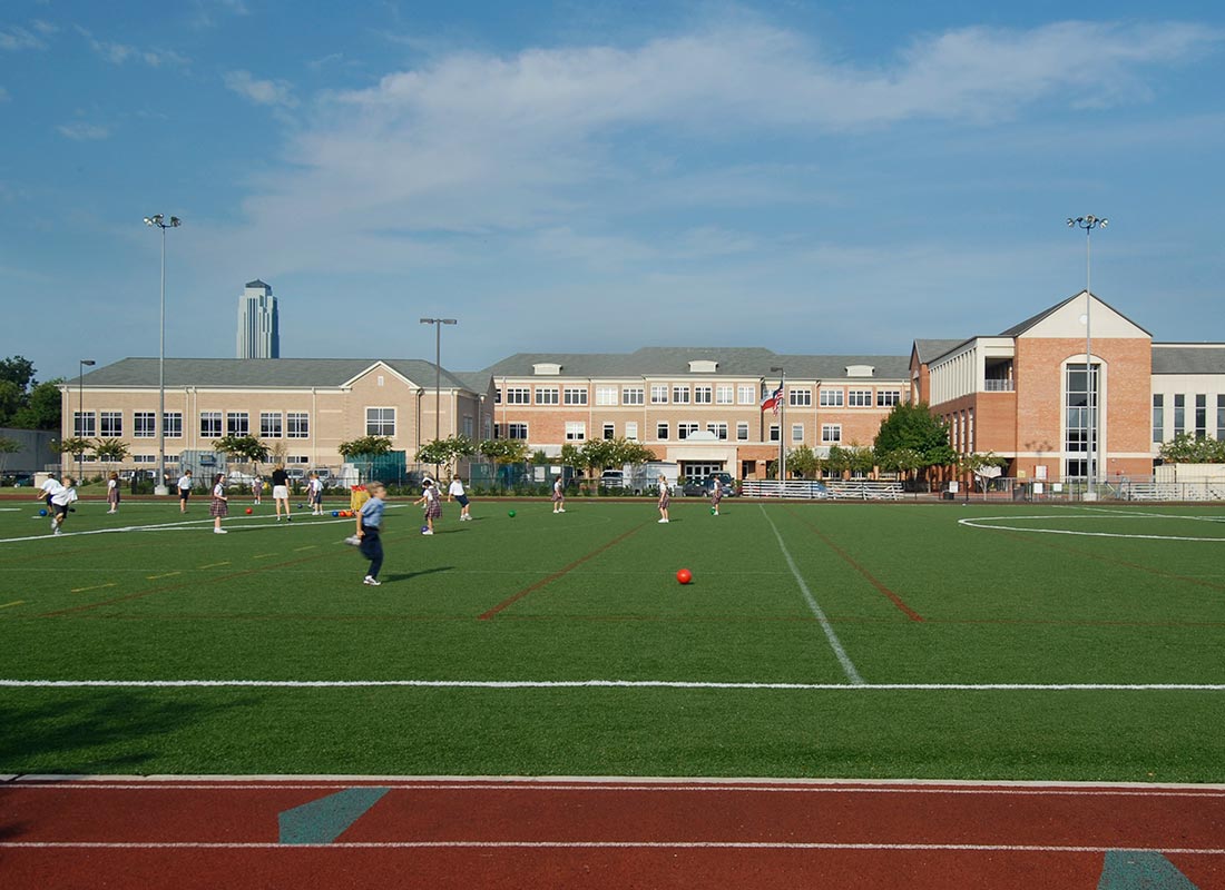 Students playing on school athletic field